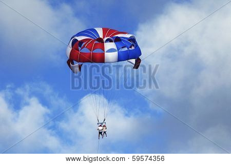 Parasailing in a blue sky in Punta Cana, Dominican Republic