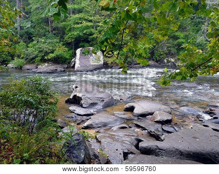 River Rapids With Boulders