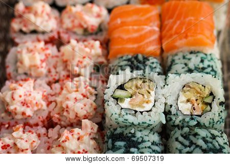 Sushi roll with salmon and caviar fish