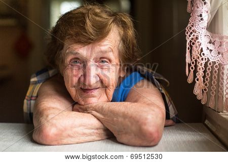 Portrait of a smiling elderly woman.