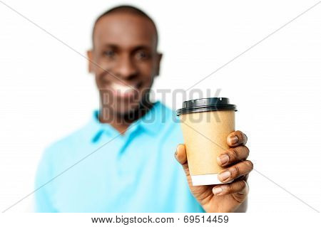 Smiling Man Holding Beverage Cup