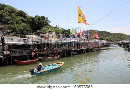 canal and stilt houses of Tai O in Hong Kong