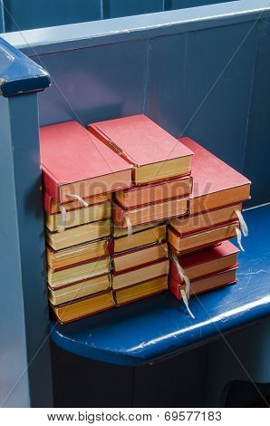 Bibles On A Blue Pew