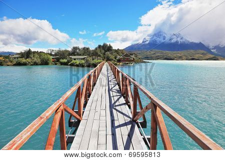 National Park Chile - Torres del Paine. Easy Bridge at Lake Pehoe connects the island and the shore of Lake