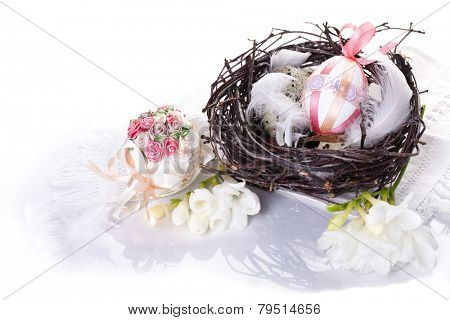 Colorful easter eggs in a nest