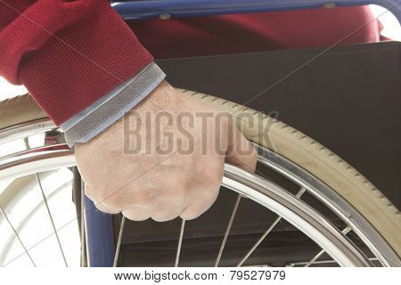 Wheelchair user makes various movements with his wheelchair, exercises for safety handling
