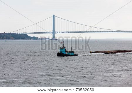 Blue Tugboat And Verrazano Bridge