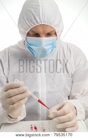 Man Testing Lab Sample