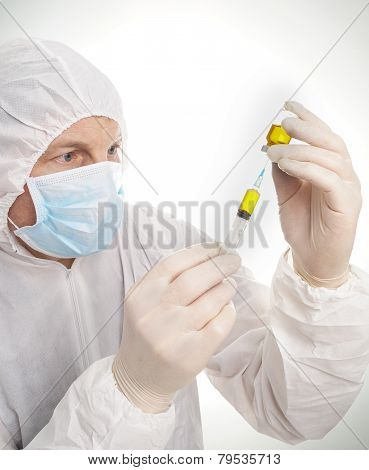 Man With Syringe And Vial