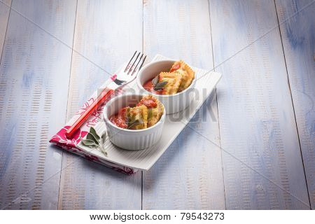 fried ravioli with tomatoes sauce