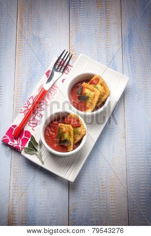 fried ravioli with tomatoes sauce