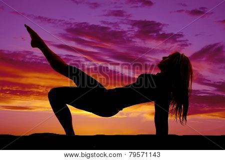 Silhouette Of A Woman One Foot Down One Pointed Up