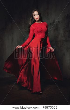 Sexy Young Lady In Fluttering Red Dress