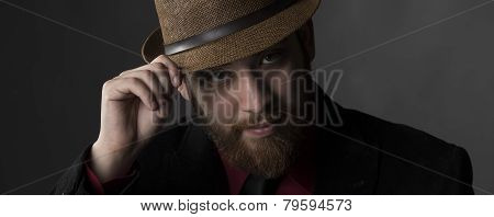 Serious Goatee Man Face with Brown Hat