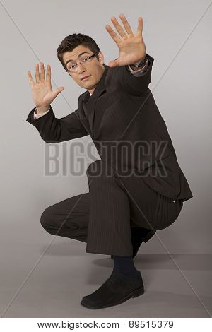Young caucasian businessman suprised and affraid