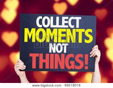 Collect Moments Not Things card with heart bokeh background