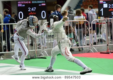 ST. PETERSBURG, RUSSIA - MAY 1, 2015: Marcus Mepstead of Great Britain vs Roland Schlosser of Austria in International fencing tournament St. Petersburg Foil. The tournament is the stage of World Cup
