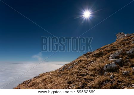 View From The Mountain Peak Above The Clouds