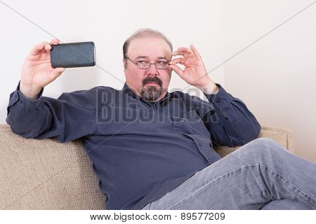 Fashionable Man Taking A Selfie On His Mobile