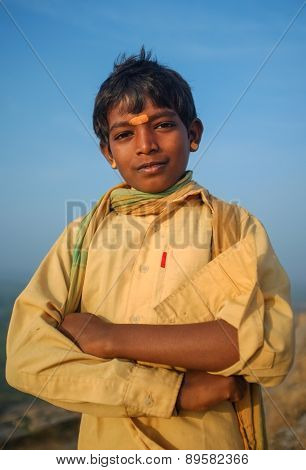 KAMALAPURAM, INDIA - 03 FEBRUARY: Young Indian pilgrim with scarf and bindi on hilltop