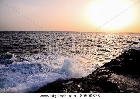 Strong Waves Crashing on the Volcanic Coast