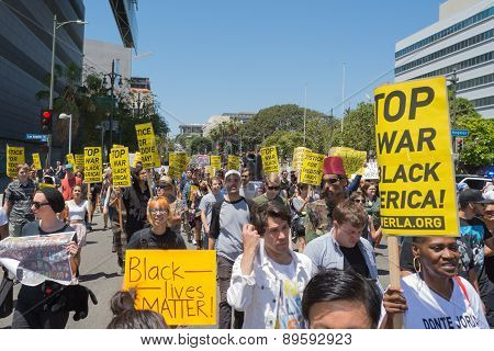 Group Of People Holding Signs