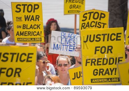 Group Of People Holding Signs