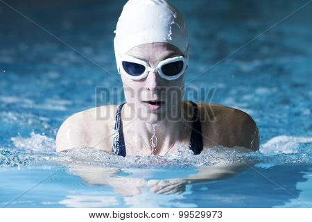 Female Swimmer Doing Breaststroke Exercise.