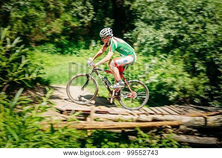 Mountain Bike cyclist riding track at sunny day, healthy lifesty