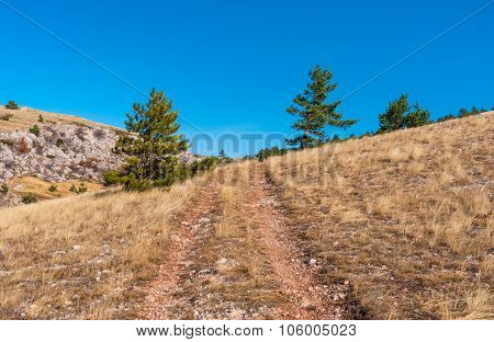 Landscape with earth road on Babuhan Yaila natural reserve in Crimea