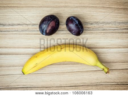 Sad Face Of Banana And Plums, Emotions, Fruit Theme