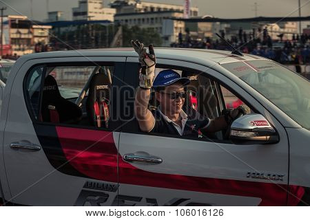 Drivers Waving Hand To The Audience After Show