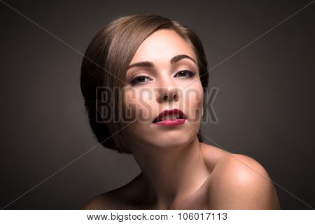 Sexy beautiful woman isolated on grey