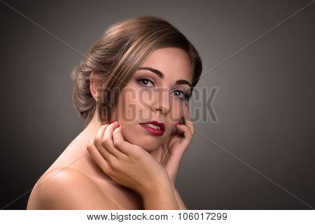 Sexy beautiful woman isolated on grey