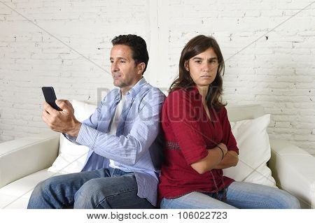 Social Network Addict Man Using Mobile Phone Ignoring Wife Or Girlfriend Upset And Angry