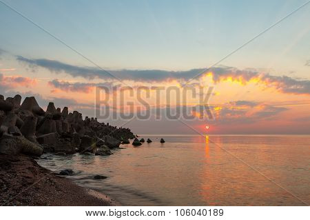 Sunset With Sun And Sunbeams At Sea