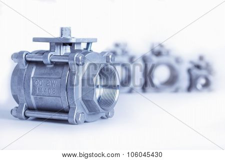 Group 4 valves different sizes ball valve with selective focus on thread fittings