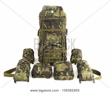 Military backpack with accessories isolated on white. Big size. Front view.