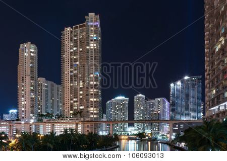 Miami Skyline At Night Along The Miami River