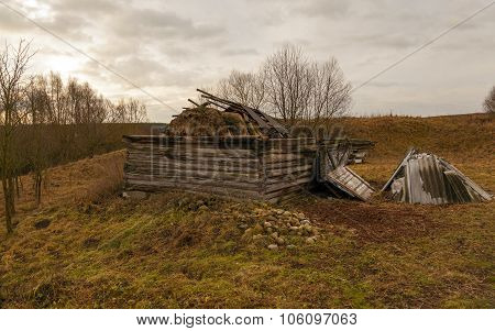 Collapsed wooden outbuilding