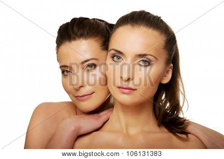 Two attractive sisters with make up.