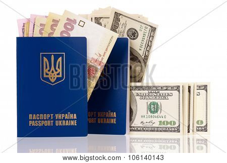 International Ukrainian passport with Hryvna and US dollars banknotes isolated on white background