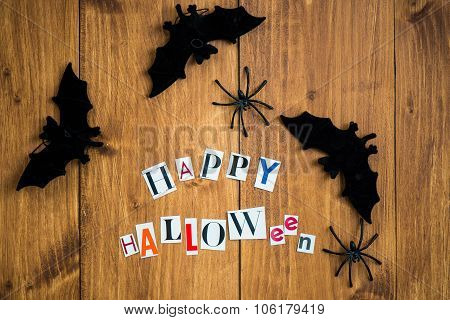 Happy Halloween Letters Cut Out From The Magazines, Bats And Black Spiders