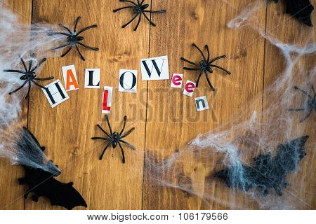 Halloween Letters Cut Out From The Magazines, Bats, Web And Black Spiders