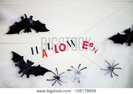 Halloween Letters Cut Out From The Magazines, Bats, Web And Black Spiders
