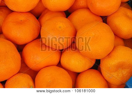 Tangerines as the background.