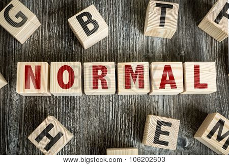 Wooden Blocks with the text: Normal