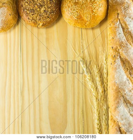 Bread And Wheat On The Wood Background, Warm Toning, Selective Focus