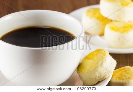 A Cup Of Coffee And Scone On Wood Background, Warm Toning, Selective Focus