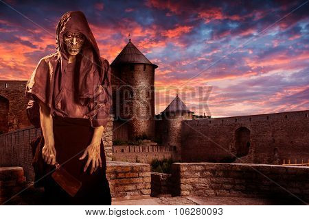 zombie on the ancient castle background. Halloween masquerade